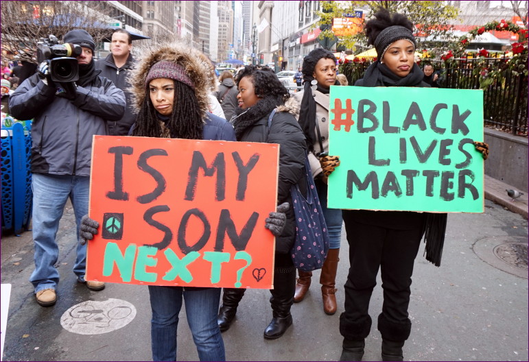 NYC action in solidarity with Ferguson. Photo: By The All-Nite Images (CC License in Flickr). 