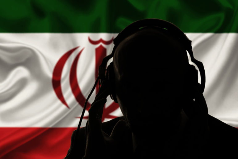 Iran agent spying, flag background