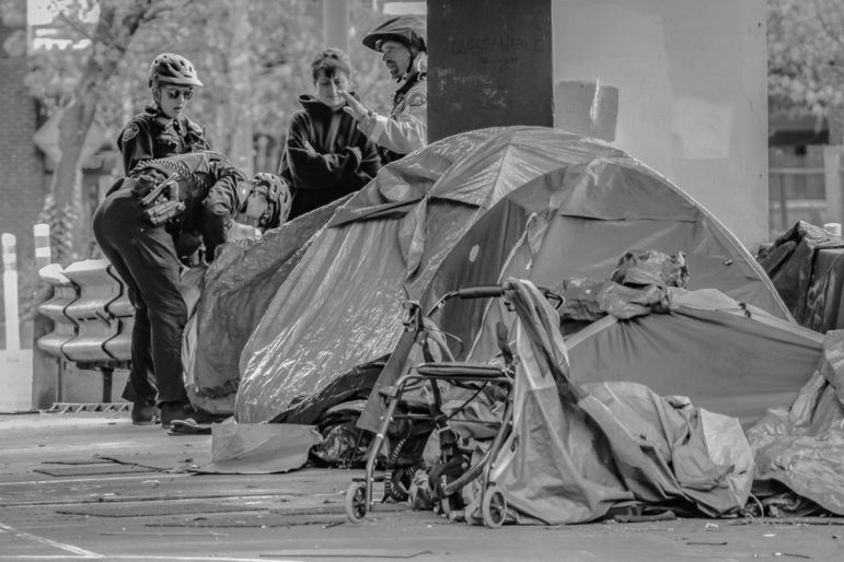 Portland Police in homeless encampment