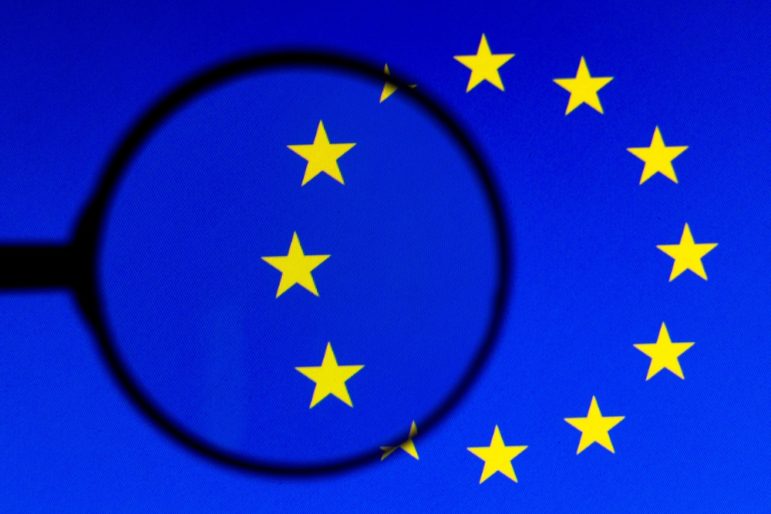 EU flag, magnifying glass