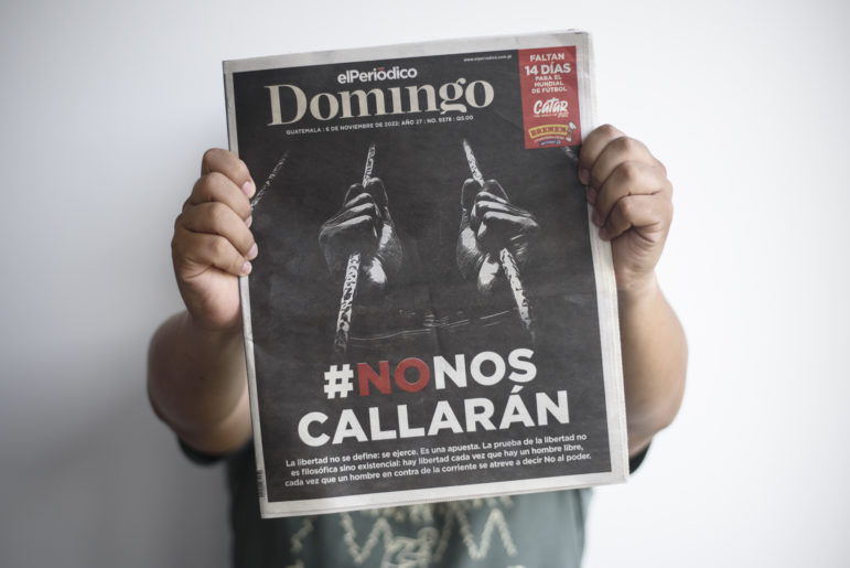 Guatemala journalist press freedom. Ramón Zamora, son of detained journalist José Rubén Zamora, holds one of the last printed editions of elPeriódico. 