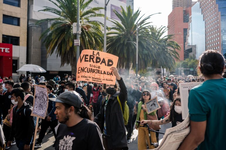 A 2022 demonstration in Mexico City protesting the federal government's lack of transparency about the killing of 43 students from the village of Ayotzinapa. Image: Shuttersock,