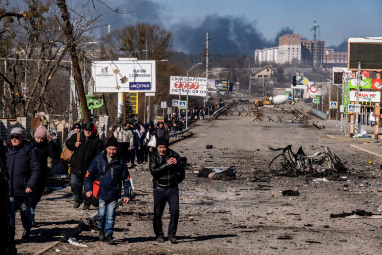 Ukrainians fleeing the Russian military as it moves into the city of Irpin, Ukraine, March 12, 2022.