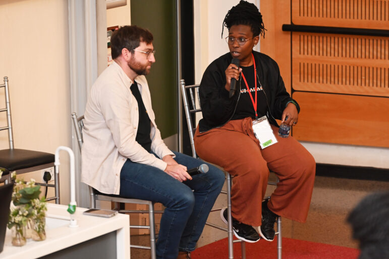 Simon Allison and Christine Mungai (right) of The Continent, speaking at a panel on covering investigations with a personal connection at a panel at AIJC25