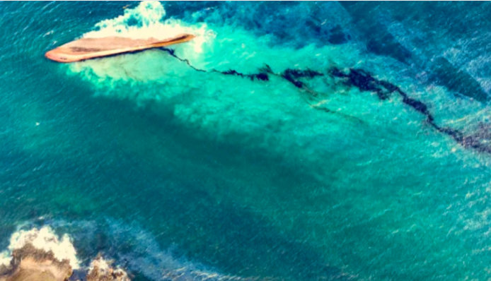 Bellingcat used the special knowledge of a marine hobbyist to unlock the identity of this capsized vessel – a towed barge – and hold its owners accountable for the vast oil spill it caused in the Caribbean. Image: Screenshot, Office of the Chief Secretary of Tobago