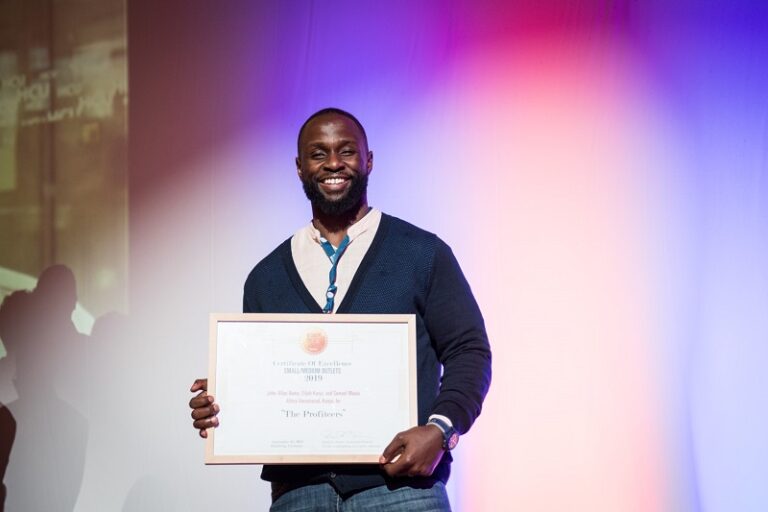 John-Allan Namu accepting a Global Shining Light Award at GIJC2019.