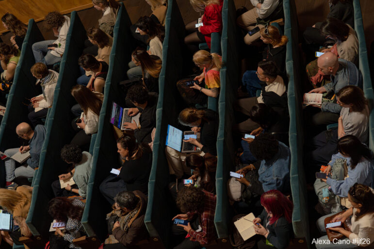 Many notebooks were open at the "From Story to Spine" session at the 2026 International Journalism Festival in Perugia. Image: Alexa Cano for IJF