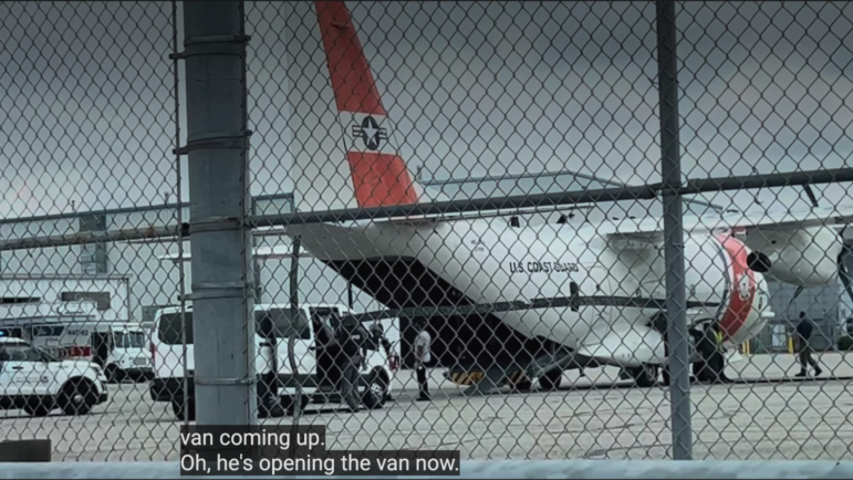A video by independent reporter Gillian Brockell provides additional proof that US Coast Guard planes meant for search and rescue — this one, staging at Baltimore — are used by US Immigrations and Customs Enforcement (ICE) to relocate captured US immigrants. Screenshot Image: Courtesy, Brockell